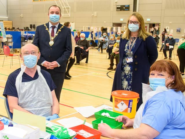 Councillor Brian Tierney, former Mayor of  Derry City and Strabane District Council, previously visited the Covid -19 vaccination centre in the Foyle Arena where he met Western Health and Social Care Trust staff who are delivering the vaccine programme. Included are Dr. Alan McKinney who is one of the retired doctors to help during the pandemic, Anne McConnell, HR Director WHSCT and School nurse Geraldine Mulholland.   Picture Martin McKeown. 28.01.21