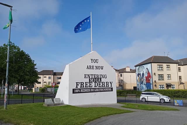 Iconic Free Derry Corner has been given a special make-over in solidarity with the families affected by MICA defective blocks across the border in neighbouring Donegal.