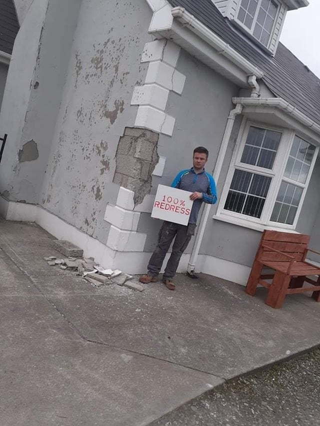 Kieran White outside his mica damaged home in Malin Town.