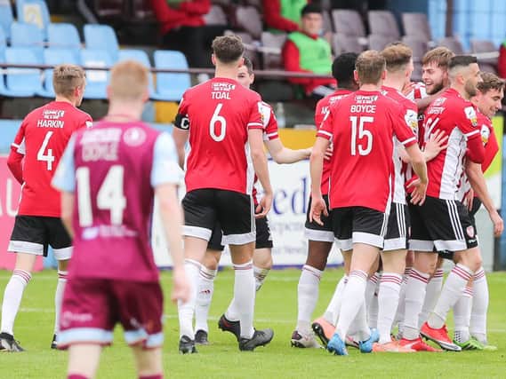 Derry City players celebrate with Will Patching, after his opening goal at Drogheda United, on Friday night. Picture by Kevin Moore/MCI