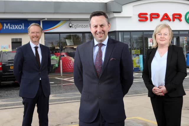 Kevin Paterson, Regional Manager NI, Brian Donaldson, CEO of The Maxol Group and Val Rodden, Licensee of Maxol Eglinton.