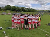 Derry hurlers in a huddle after defeating Donegal at Ballinascreen on Sunday.