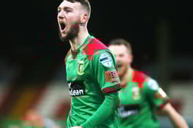 Glentoran's Jamie McDonagh celebrates after scoring a late winner against Cliftonville. Picture by Jonathan Porter