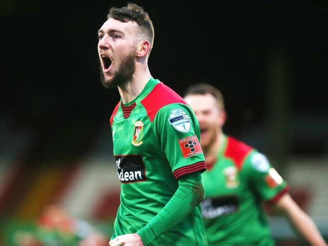 Glentoran's Jamie McDonagh celebrates after scoring a late winner against Cliftonville. Picture by Jonathan Porter
