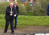 2015: Martin McGuinness and Gerry Kelly fishing. (Kevin Scott / Presseye)