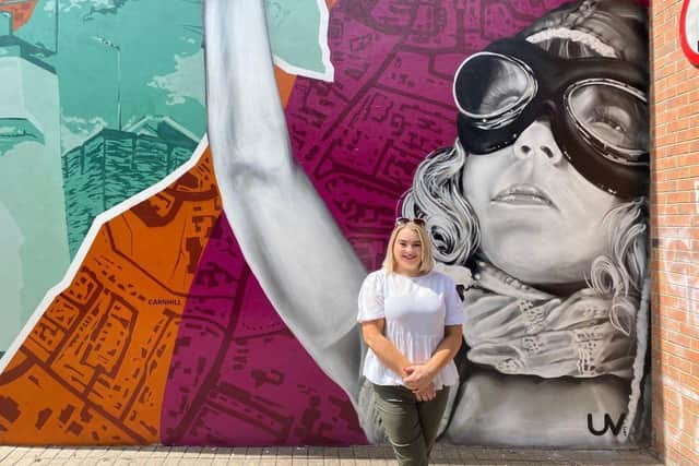 Councillor Sandra Duffy at Amelia Earhart mural at the weekend