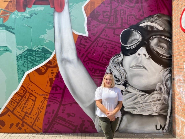 Councillor Sandra Duffy at Amelia Earhart mural at the weekend