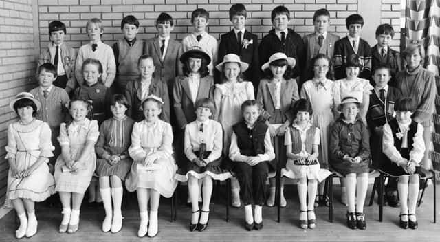 Childen from one of the P7 classes at Carnhill PS who made their Confirmation in May 1983.