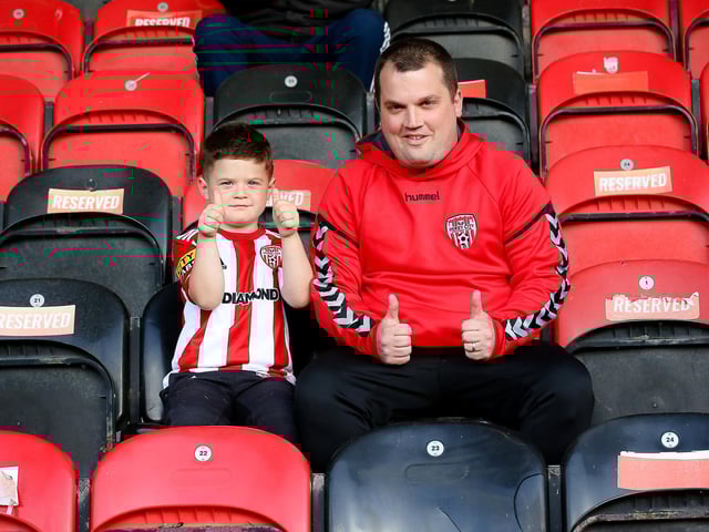Five year-old Celeb Toland and his father Richie give our photographer the thumbs up on their return to Brandywell Stadium. Photos by Kevin Moore.