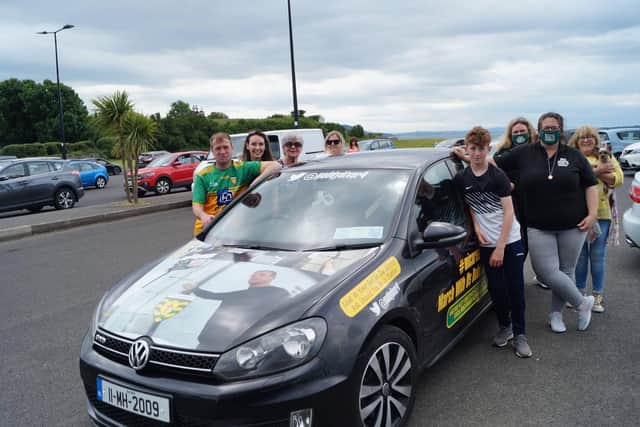 Ready to go: Paddy Diver, pictured with his family and fellow campaigners after handing out posters and stickers at Buncrana Shore Front on Sunday. Photo: Rory Kelly.