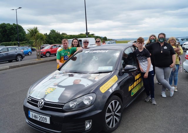 Ready to go: Paddy Diver, pictured with his family and fellow campaigners after handing out posters and stickers at Buncrana Shore Front on Sunday. Photo: Rory Kelly.