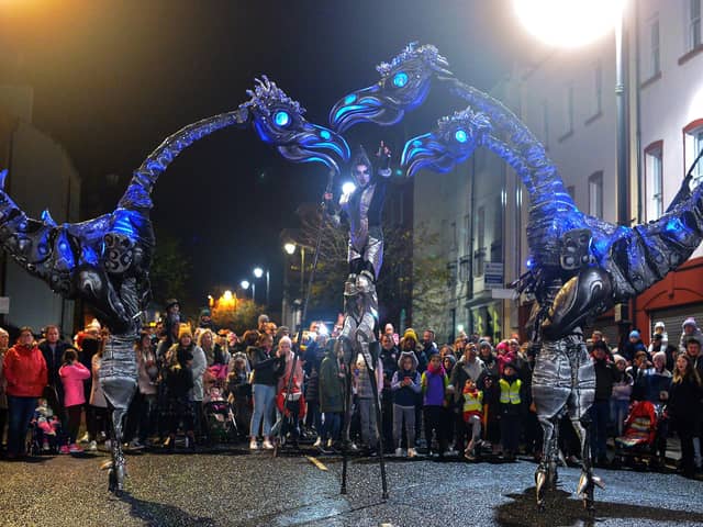 The giant Sarusus entertain the crowds at the Awakening on the Walls carnival in the city centre.  DER4419GS - 016