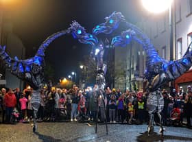 The giant Sarusus entertain the crowds at the Awakening on the Walls carnival in the city centre.  DER4419GS - 016