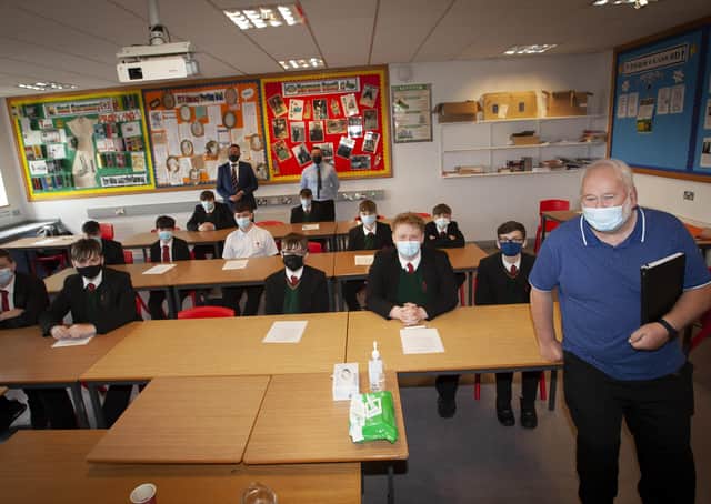 Retired Derry Journal editor Pat McArt talkiing to Year 11 history/politics students at St. Josephâ€TMs Boys School this week. He gave a talk on his time at the Journal and the 1980s hunger strike as well as a Q&A with the students on the changing face of Derry. Included at back are teachers, Mr. Peter Smith and Mr. John Oâ€TMLoughlin. (Photos: Jim McCafferty Photography)