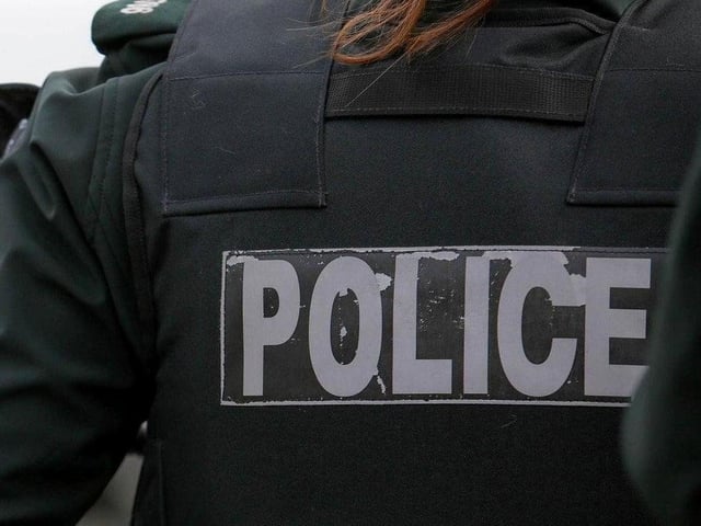 Police charge sixth person in connection with Tullyally riots.