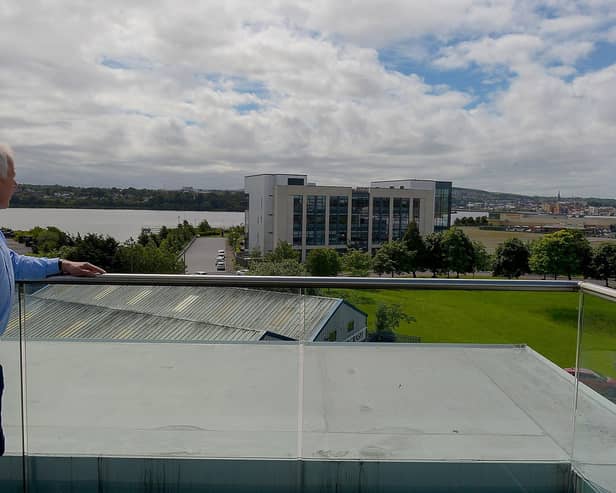 Local businessman Garvan O’Doherty and the derelict Fort George (site in the background). DER2124GS – 019