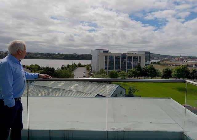Local businessman Garvan O’Doherty and the derelict Fort George (site in the background). DER2124GS – 019