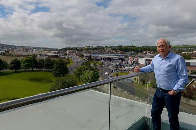 Local businessman Garvan O’Doherty and the derelict Fort George (site in the background). DER2124GS – 018