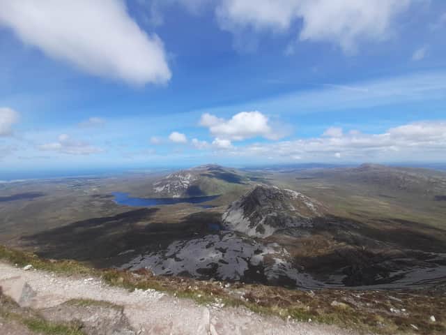 A view of Lough Altan, nestled between Mackoght and Aghla More, with Magheroarty, Falcarragh, Dunfanaghy and Rosguill in the distance.