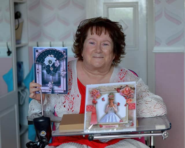 Mrs Linda Kivlehan pictured, in her home, with some of the greeting cards she made during the Covid 19 lockdown. DER2125GS - 001