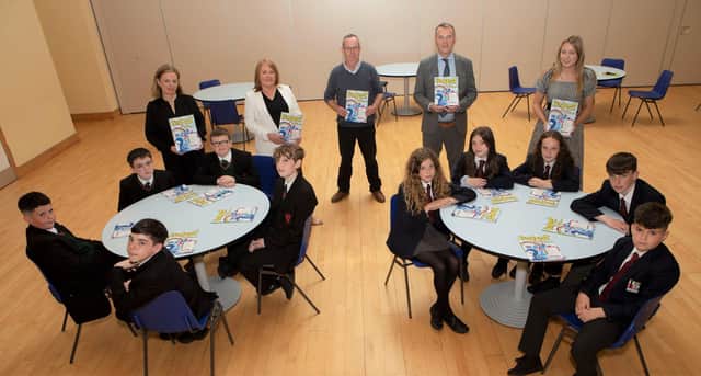 Pupils from St Joseph's Boys School and Lisneal College, who took part in the Children’s Safety Education Programme, funded by the Housing Executive, and held in Lisneal College. Front from left, Callum Keenan, Shay Smith, Darragh O'Donnell, Ryan White and Aidan McFeely-Doherty, Emily Hamilton, Anna Loughery, Chloe O'Kane, Jacob Bond and Hari Gillespie. Standing, from left, are Fiona Harrigan, Learning Support Manager Lisneal College, Jackie O'Kane, Housing Executive, Eddie Breslin, Housing Executive, Michael Fitzgerald, Children's Safety Education Foundation, and Aisling O'Kane, Learning for Life and Work Co-Ordinator St Joseph’s Boys School.