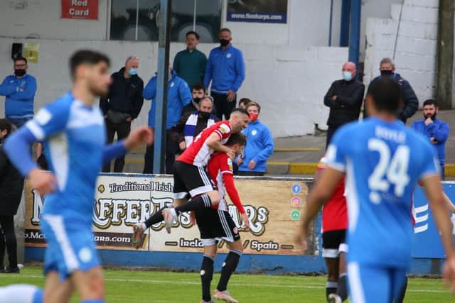 Danny Lafferty celebrates with goalscorer Will Patching. Photograph by Kevin Moore.