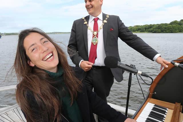 Sailor, pianist and songwriter Marieke Huysmans Berthou and Mayor of Derry City and Strabane District Council Alderman Graham Warke.