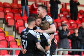 Derry City players celebrate after Ronan Boyce's late equaliser at Brandywell. Photo by Kevin Moore.