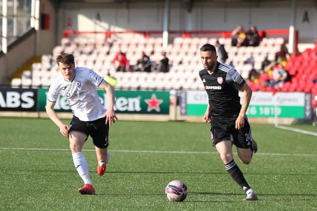 Danny Laffety bursts past Lewis Banks before setting up David Parkhouse for Derry's best chance in the first half. Photograph by Kevin Moore.