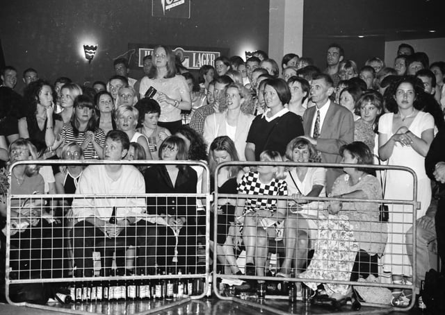 An anxious crowd awaiting the results of the 1996 Miss Derry competition in Squire’s nightclub.