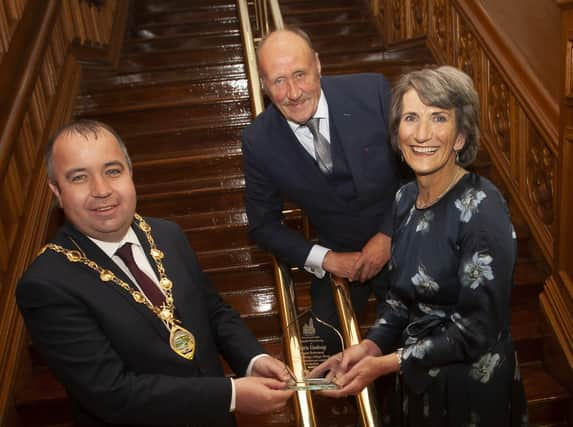 MARIE HONOURED. . . . .The Mayor of Derry City and Strabane District Council, Brian Tierney making a presentation to Marie Lindsay, former Principal, St. Maryâ€TMs College, Derry, on the occasion of her retirement and recognition of  her contribution and commitment to education. Included is Marieâ€TMs husband Collie. (Photos: Jim McCafferty Photography)