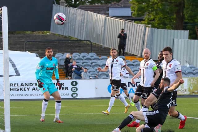 Danny Lafferty fires over at the back post in the second half. Photograph by Kevin Moore.