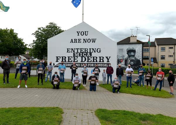 Group pictured during a Time for Truth and Justice protest, organised by Sinn Fein and calling for a withdrawal of an amnesty for British state forces, at Free Derry Wall on Saturday afternoon last. DER2125GS - 079