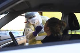 People in various parts of Derry have been urged to get tested.  (File picture: Michael Cooper/PA Wire)