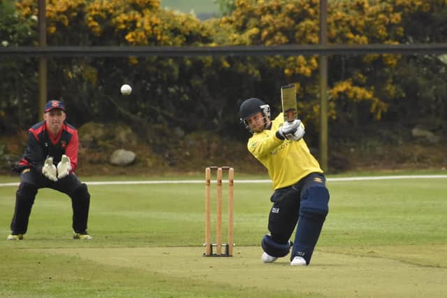 Fox Lodge's Jason Milligan drives to the boundary, during their game against Bready. Picture by Lawrence Moore