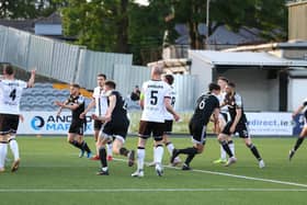 Eoin Toal races away to restart the game after finding the back of the net against Dundalk at Oriel Park. Photograph by Kevin Moore.