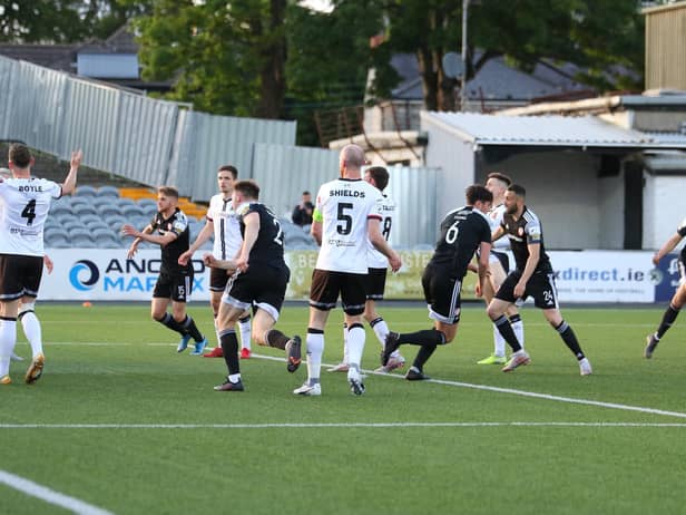 Eoin Toal races away to restart the game after finding the back of the net against Dundalk at Oriel Park. Photograph by Kevin Moore.