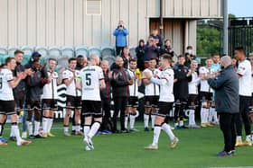 Dundalk players perform a guard of honour for skipper Chris Shields who played his last game for the club against Derry City in Oriel Park last Friday night. Photo by Kevin Moore.