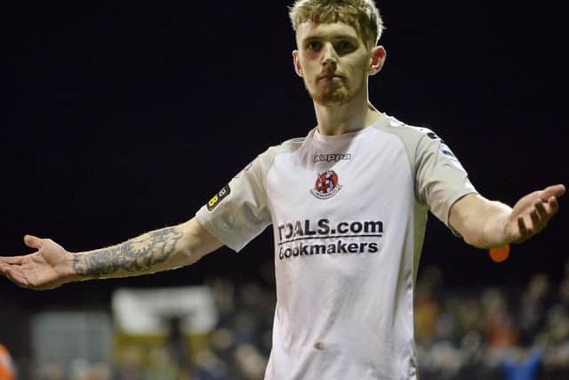 Derry City has completed the transfer of Jamie McGonigle from Crusaders.