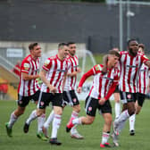 Evan McLaughlin celebrates his debut goal against Waterford. Photograph by Kevin Moore.