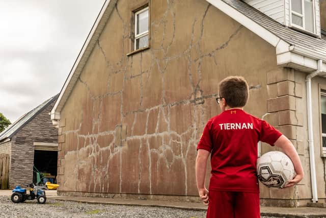 Tiernan looks at the mica damaged wall of his home in Inch in Donegal. Photo: Brendan Diver.