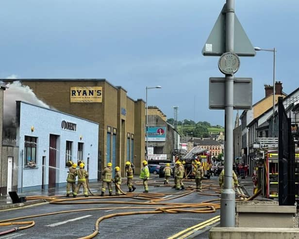 Firefighters tackling the blaze on Sunday. Picture posted by Daniel McCrossan MLA who owns a pub across the street.