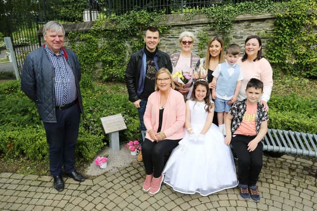 Thomas Morrison with the family of the late Billy Chambers at the unveiling of a plaque in memory of Billy, a founder member of Derry and District Beekeepers’ Association.