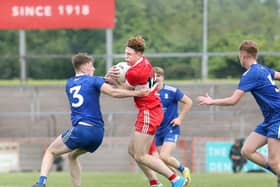 Derry's Lachlan Murray takes on Monaghan's Louis Kelly of Monaghan during the Friday's Ulster Minor Football Championship Final in Healy Park.