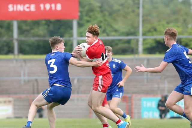 Derry's Lachlan Murray takes on Monaghan's Louis Kelly of Monaghan during the Friday's Ulster Minor Football Championship Final in Healy Park.