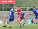 Derry's Lachlan Murray takes on Monaghan's Louis Kelly of Monaghan during the Friday's Ulster Minor Football Championship Final in Healy Park.