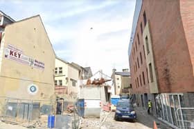 The 22 flats will be located in the rear laneway of the Strand Hotel building.