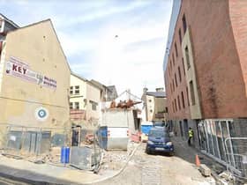 The 22 flats will be located in the rear laneway of the Strand Hotel building.