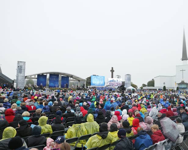 2018: Crowds wait for Pope Francis during a visit to Knock Holy Shrine, in County Mayo to view the Apparition Chapel and to give the Angelus address, as part of his visit to Ireland. Niall Carson/PA Wire