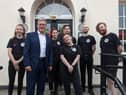 Labour leader Keir Starmer with staff from the Walled City Brewery.